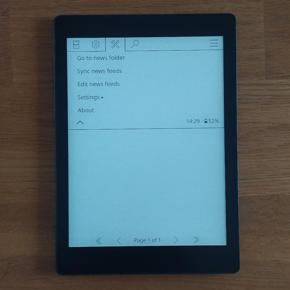 Photo of Kobo showing menu of News Downloader plugin.
